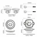 Ceramic tableware set size chart with bowls, plates, and spoons featuring a smiley face. - 6 Pieces Set