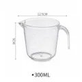Clear plastic measuring cup 300ml with scale lines and handle for baking and kitchen use. - 300ml