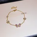 Elegante pulsera de mariposa dorada con esmalte morado y cristales para mujeres joyería. - 38# Pulsera - Dorado - Púrpura