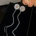 Luxury sparkling zircon flower tassel earrings for women, elegant rhinestone court banquet jewelry. - Silver
