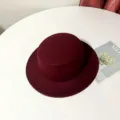 Detailed view of the dark red flat top wool felt hat, stylish British fedora cap accessory. - M (56-58cm) / Burgundy