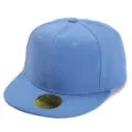 Detailed view of the light blue flat brim baseball snapback cap with size sticker on brim. - Adults / Solid Sky Blue