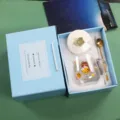 Detailed view of cute cartoon bear glass mug gift set with ceramic lid, golden spoon, 500ml. - Brown Bear Mug with Lid & Spoon in Blue Gift Box