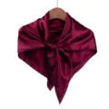 Burgundy silk satin square scarf detail shot, smooth texture, elegant neckerchief drape. - Dark Red