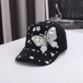 Schwarze Damen Baseballcap mit funkelndem Strass Schmetterling und tollem Sonnenschutz. - Einheitsgröße / Schwarz