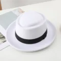 Close-up detail of a classic white felt fedora hat featuring a stylish black ribbon band. - One Size / White
