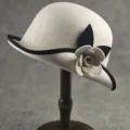 Elegant Hepburn style wool cloche hat with black trim and 3D camellia flower decoration. - One Size approx. 57cm / Cream