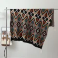 Bohemian knitted throw blanket with geometric patterns and fringe, perfect for sofa and bed decor. - Cloud Step Star / Black Orange