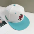 Color block snapback baseball cap with cartoon apple embroidery, stylish outdoor sun hat. - 56-60cm / Cream/Blue