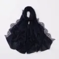 Detail view of the dark blue chiffon hijab scarf featuring delicate lace eyelash trims. - Navy Blue