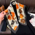 Detailed view of the elegant Maillard silk scarf featuring vibrant floral totem prints, perfect for spring. - RY-11