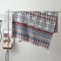 Bohemian knitted sofa throw blanket with geometric tribal pattern and tassels for home decor. - Red Soil Green Peak / Multicolor