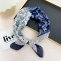 Blue and white paisley pattern silk scarf detail shot, elegant neckerchief and hair band. - Navy Patchwork Paisley