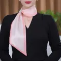 Close-up detail view of the elegant pink gradient silk twilly scarf with rhinestone buckle. - Pink Edge Lotus Root