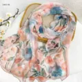 Detailed view of floral print milk crepe scarf, elegant watercolor design, lightweight fabric. - RY-20