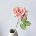Handmade crochet pink rose flower detail view, knitted floral decor for gifts and home styling. - Gradient Pink
