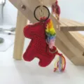 Handmade crochet red horse keychain with colorful mane, lucky pony bag charm for keys. - Bright Red Pony