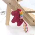 Handmade crochet horse keychain with colorful rainbow mane gold trim cute bag charm pendant - Dark Red Pony