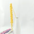 Handcrafted crochet yellow millet flower variant with colorful bouquets and white ceramic vase. - Yellow