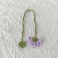 Handmade crochet flower bookmark with cute leaf accent, soft yarn knitting for reading. - Purple Flower Bookmark / Purple
