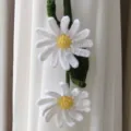 Handmade crochet white daisy curtain tieback detail, floral hanging decor, soft yarn fabric. - Wild Daisy