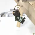 Handmade crochet dachshund dog keychain, cute puppy bag charm with green sweater pendant. - Green Puppy