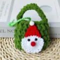Handmade crochet Christmas Santa coin purse, cute Bluetooth headset storage bag and keyring gift. - Santa Claus Style Bag