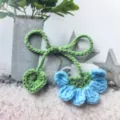 Handmade crochet flower bookmark with green stem and blue blossom, cute reading accessory. - Blue