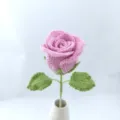 Handcrafted crochet pink rose flower with stem and leaves in white vase for home decor gift. - Light Pink