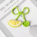 Handcrafted crochet lemon and heart charm with green bow, cute knitted bag pendant accessory. - Yellow Lemon