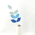 Handmade crochet gradient leaf branch with ceramic vase for elegant home decor and gifting. - Gradient Blue Rose Leaves