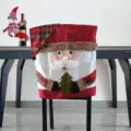 Detailed close-up view of the Christmas Santa Claus chair cover, featuring festive red and plaid. - Cartoon Santa