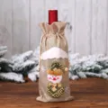 Housse de bouteille de vin en jute de Noël avec joli design de bonhomme de neige décoration de fête. - Housse de bouteille en lin beige bonhomme de neige