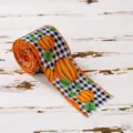 Autumn thanksgiving buffalo plaid ribbon roll featuring orange pumpkins and leaves for craft and decor. - Thanksgiving Ribbon Style A