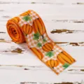 Thanksgiving autumn harvest ribbon with orange pumpkin and plaid pattern for gift wrapping. - Thanksgiving Ribbon Style C