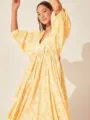 Yellow floral print V-neck puff sleeve midi dress detail view, perfect for beach vacation. - S / Yellow Floral