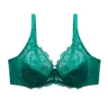 Dark green lace plus size full cup bra detail showing delicate floral pattern and bow. - Green