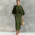 Detailed view of the green linen two-piece set, featuring batwing sleeves and long skirt. - Army Green