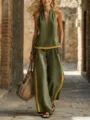 Dettaglio di un elegante set estivo con top smanicato e pantaloni ampi in una strada antica. - 3XL / AK-0973-2