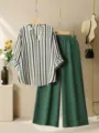 Detailed view of the summer casual V-neck striped shirt and green wide leg pants set. - S / Top And Bottom / Green