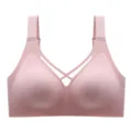 Comfortable pink seamless bra with wide straps and mesh crossover design for daily wear. - M / Dusty Pink