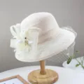 Vintage beige women lace bucket hat featuring elegant net veil and floral feather detail. - Adjustable / Beige