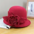 Close-up detail of a red wool felt bowler hat with a large 3D flower decoration. - Solid Color Peony - Wine Red / Adjustable