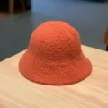 Orange fuzzy wool bucket hat for women, minimalist solid color winter basin hat style. - Adjustable / Orange