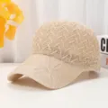 Close-up view of a beige mesh baseball cap, showcasing breathable hollow knit texture and details. - 55-60cm Adjustable / Beige