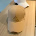 Classic beige baseball cap with stylish embroidered triangle front design for daily wear. - Adjustable / Orange