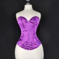 Purple satin corset detail showing front metal busk closure and heart-shaped neckline. - XXS / Tops / Purple