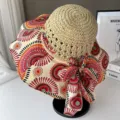 Chapeau de soleil en paille bohème avec large bord imprimé floral et nœud pour l'été. - Taille unique / Beige à cercles rouges