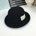 Chapeau cloche noir en tricot à rebords roulés avec patch, chapeau de soleil vintage britannique. - M (56-58cm) / Noir