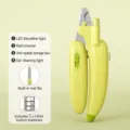 Green pet nail clipper with LED light and nail file, banana design for cats and dogs. - Banana Nail Clippers / White Light Green